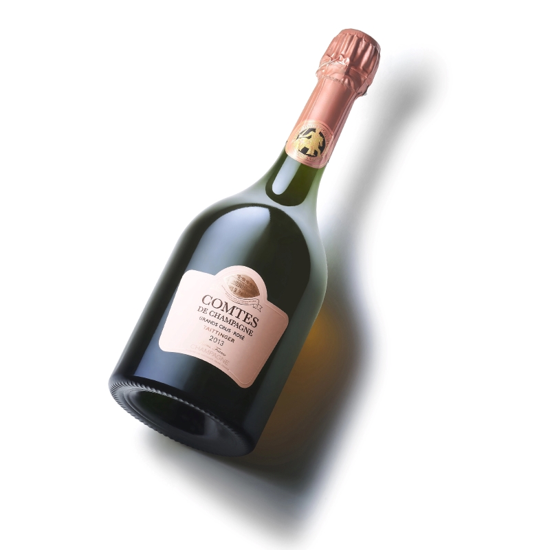 Garrafa do Comtes de Champagne Rosé destacando a elegância da Maison Taittinger