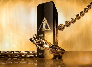 Rabanne 1 Million Night Elixir com corrente dourada ao redor do frasco