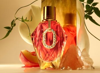 perfume feminino de luxo Rabanne Million Gold For Her Pure Diamonds em destaque com frasco dourado